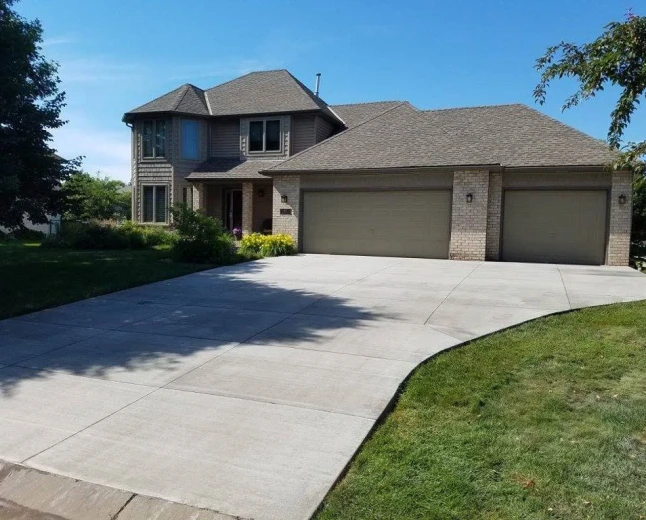 Cracks, Holes, or Uneven Concrete? Driveway Solutions in Galveston, TX